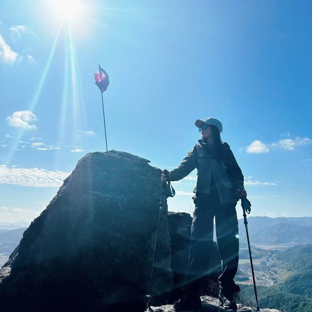 hoko-founder-standing-on-mountaintop-looking-confident
